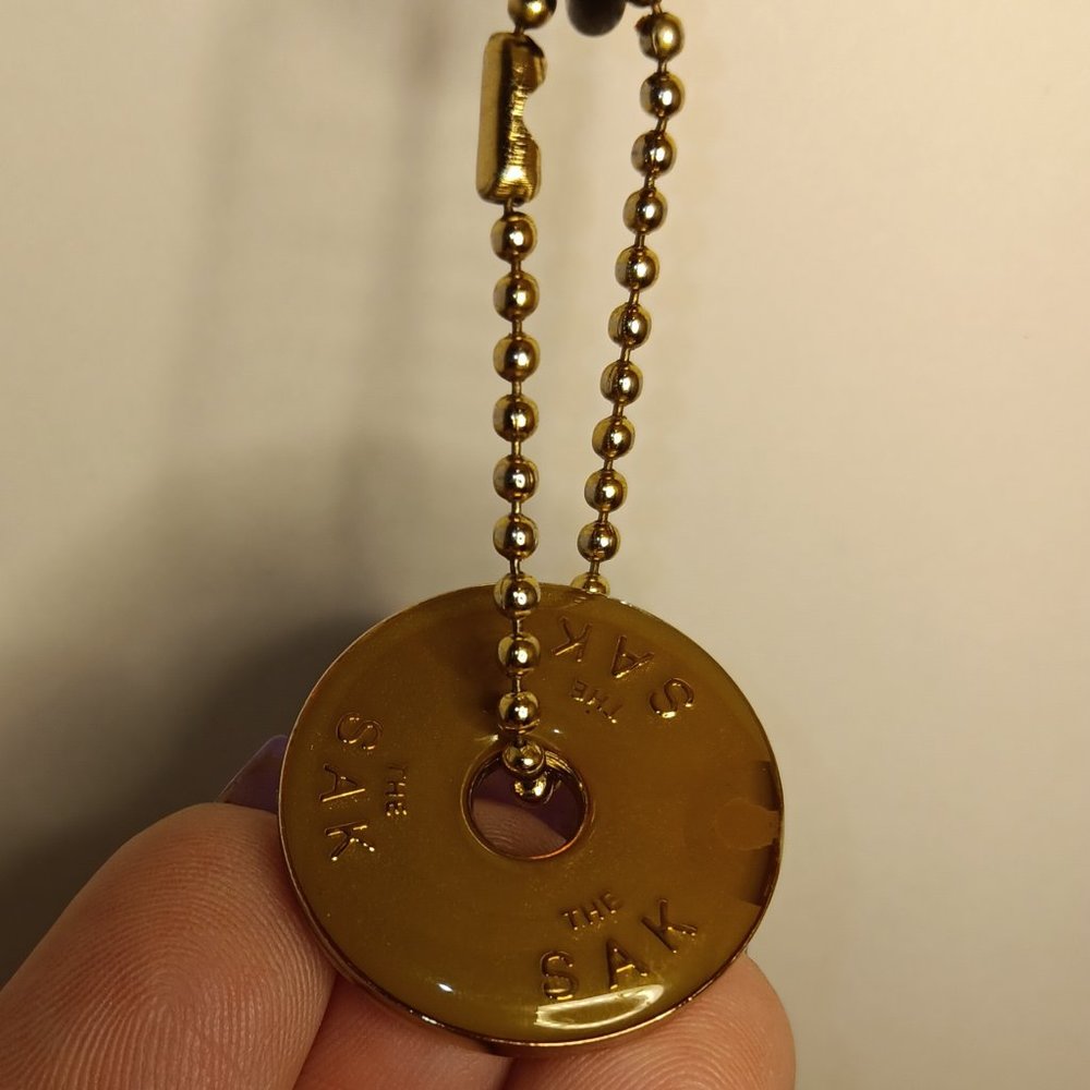 THE SAK BROWN SILVER ROUND DISC BALL CHAIN FOB KEYCHAIN BAG CHARM HANG TAG